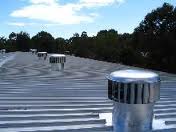 Industrial whirlybirds on warehouse roof